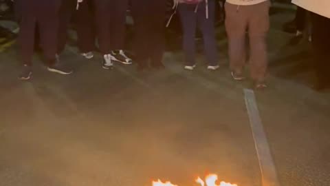 BREAKING: Scumbags are burning American flag in downtown LA.