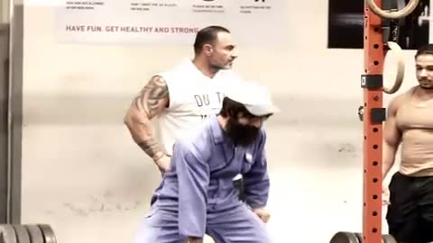 people shocked of older guy lifting in the gym