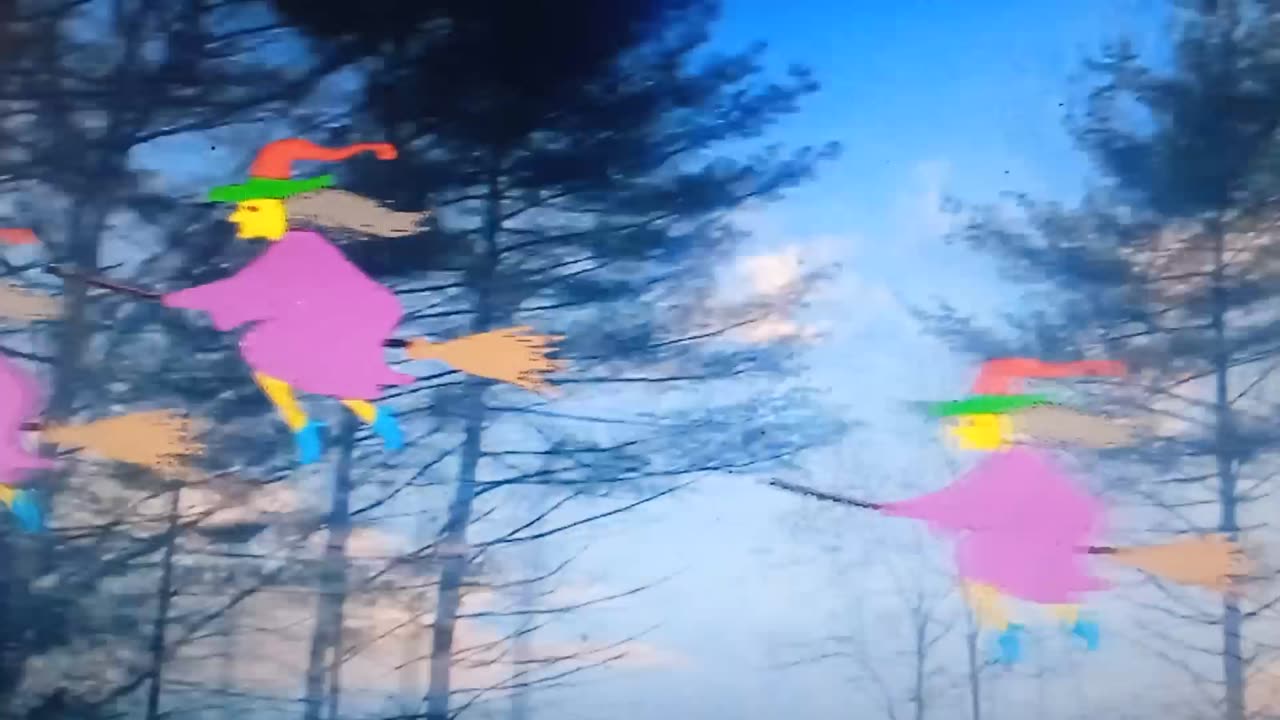 group of witches in the sky