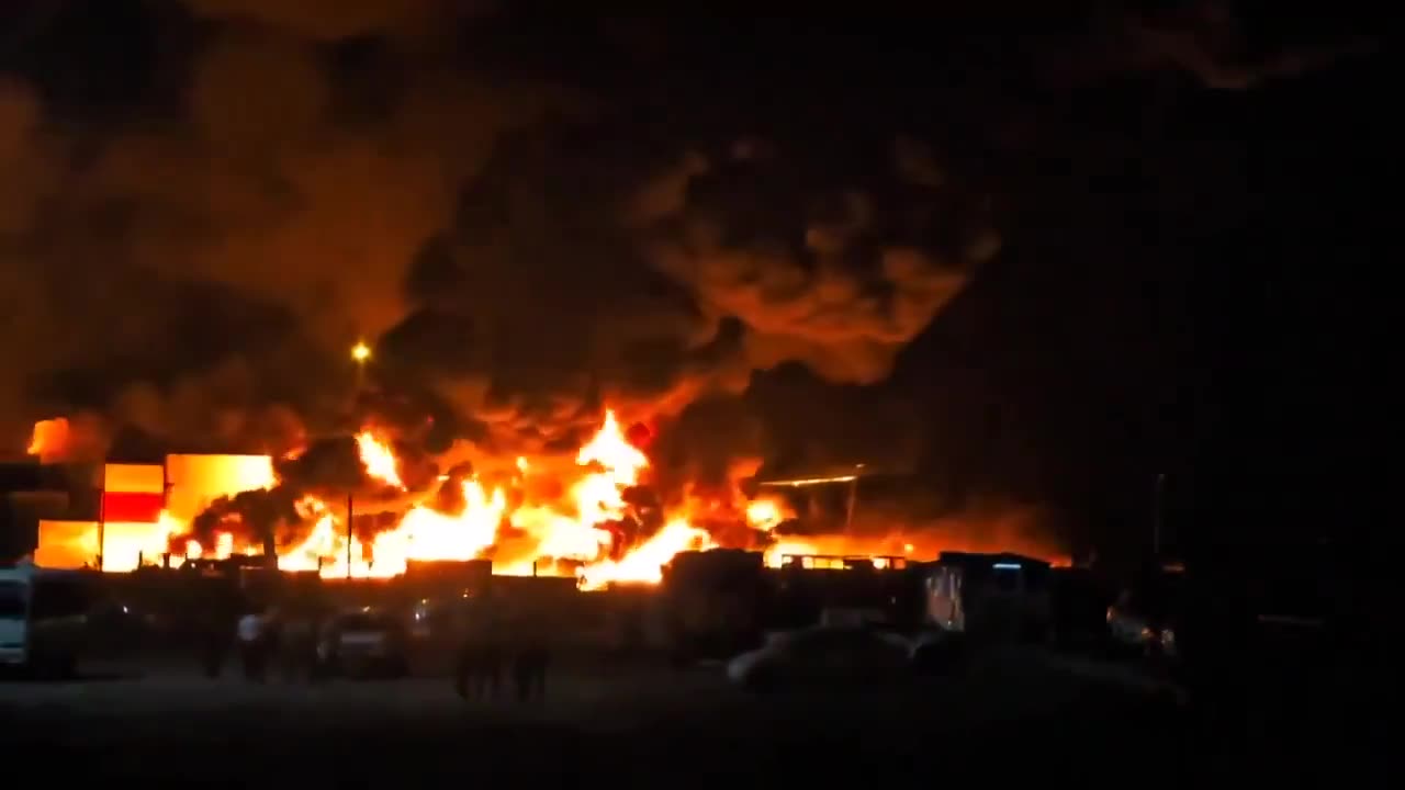 Massive explosion rocks Iraqi port, still burning during nightfall...