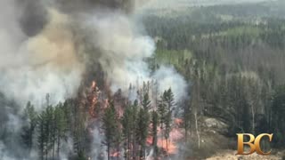Western Canada wildfires emergency hits another province as thousands flee