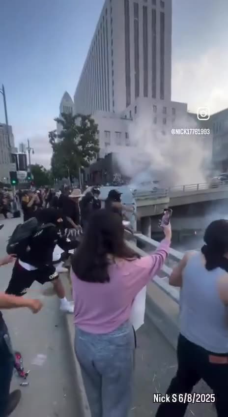 LA Riots - Peaceful Protesters throwing rocks off bridges at Police