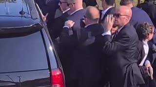 THIS ANGLE OF TRUMP BEING CARRIED OFF IS GOING VIRAL AS MORE PEOPLE START TO NOTICE ⚠️