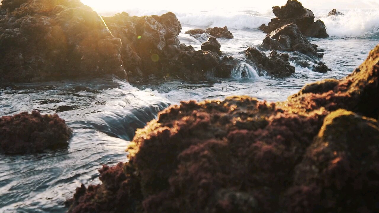 Water Crashing Over The Rocks