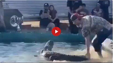 So a dumb ass sticks his foot in a gators mouth...guess what happens.