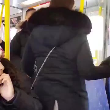He forces the old Swedish woman to get up because he wants to sit in her place.