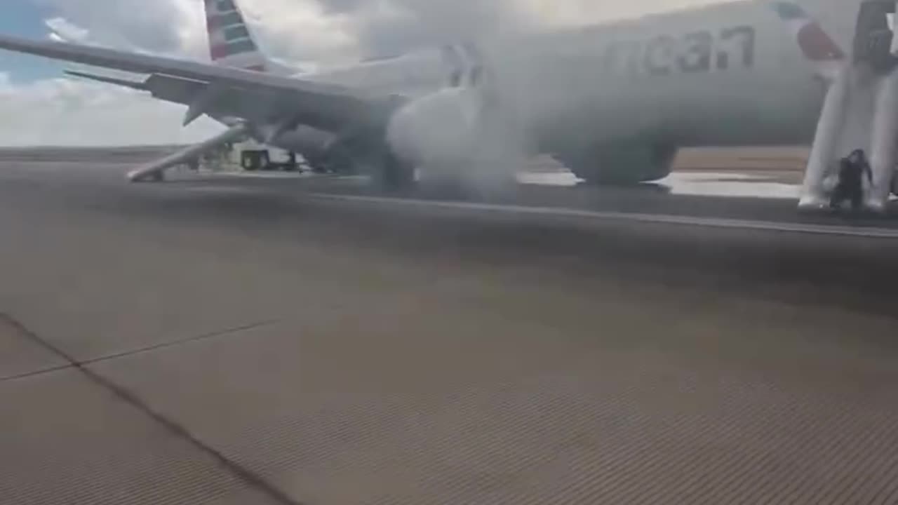 An American Airlines plane caught fire at Denver Airport, and passengers were evacuated.