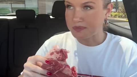 Woman goes viral showing off that she eats raw meat