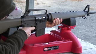 Mrs Koba tries out the Retro AR 601 rifle