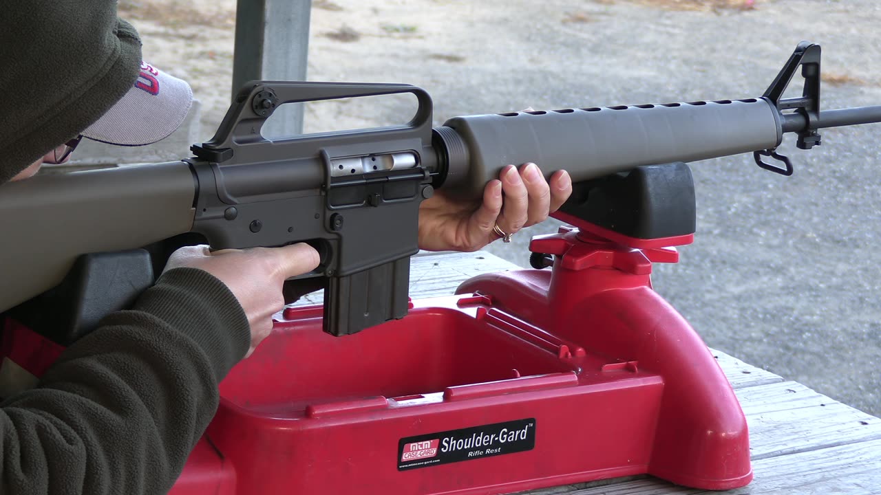 Mrs Koba tries out the Retro AR 601 rifle