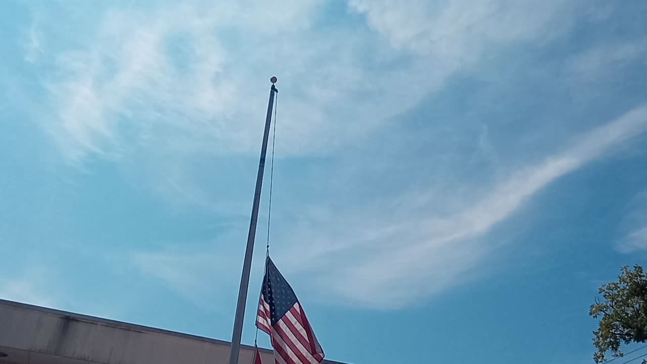 Flag Flying at Half Mask