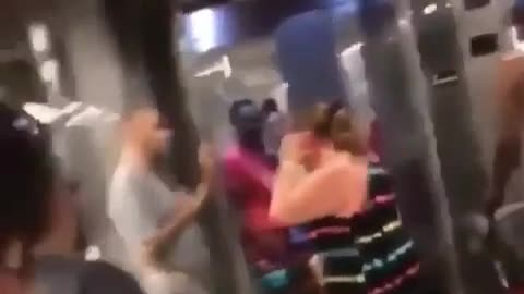 Blacks attack an elderly white woman