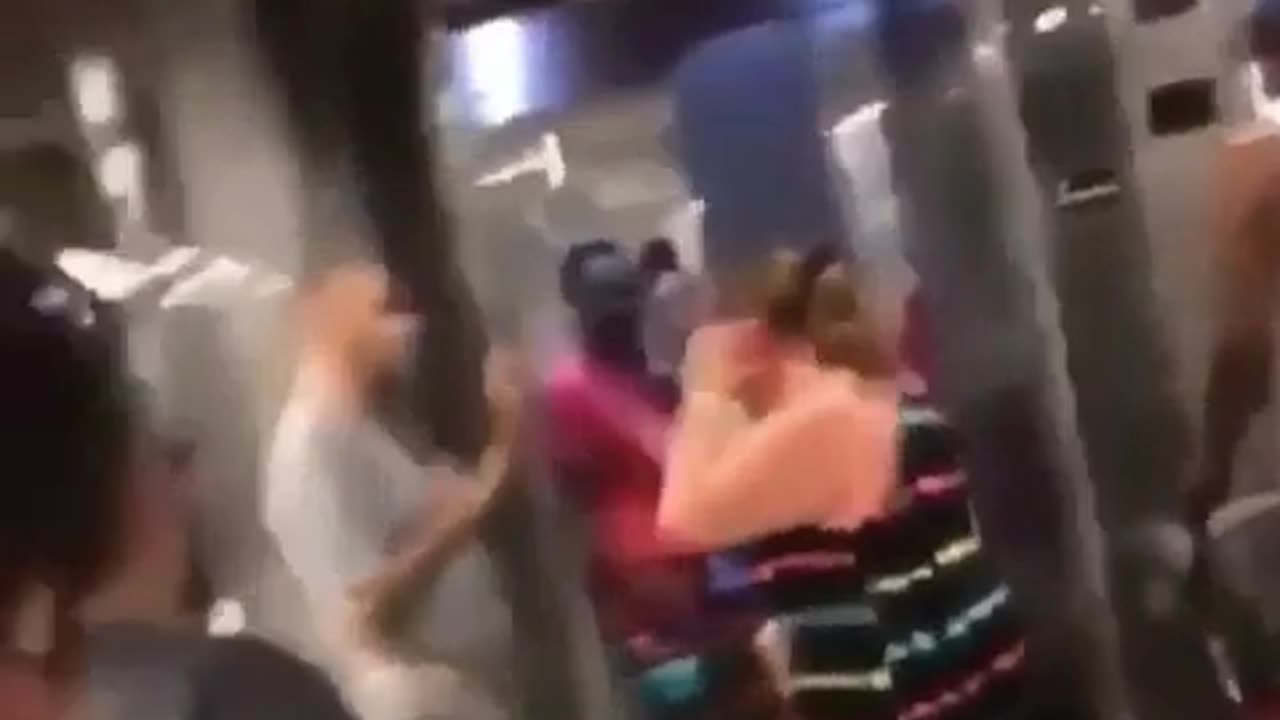 Blacks attack an elderly white woman