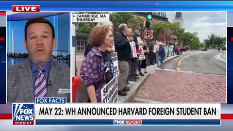 In the hot seat, Harvard says Trump is "doing the