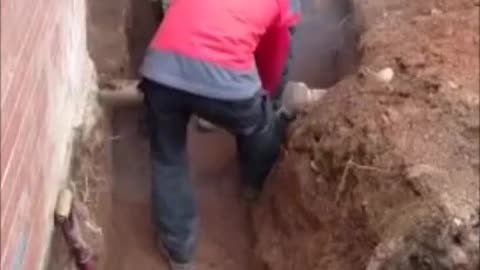 This worker gets hit in the face by a circular saw but is going to be very lucky