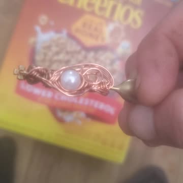 A Wirewrapped spoon with a Pearl