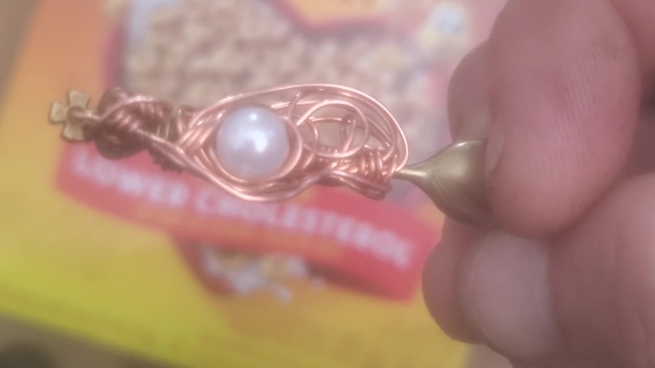 A Wirewrapped spoon with a Pearl