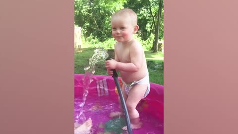 Funny Babies Playing With Water