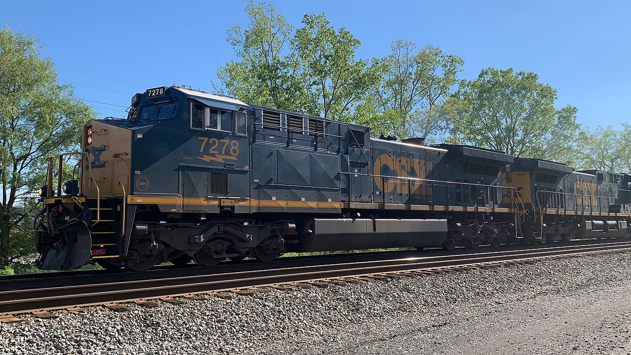 CSX Trains 7278 and 7091 and geep 4232 pulling mixed freight
