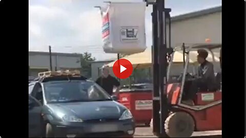 This guy thinks he is going to move a one ton bag of sand ON TOP of his FORD FOCUS. 😳😆