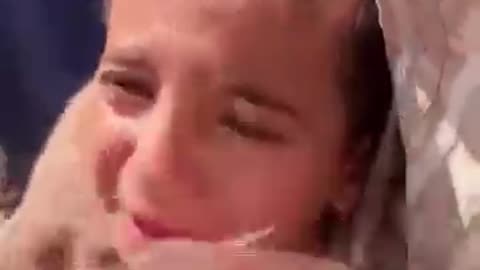 Palestini boy crying for his parents