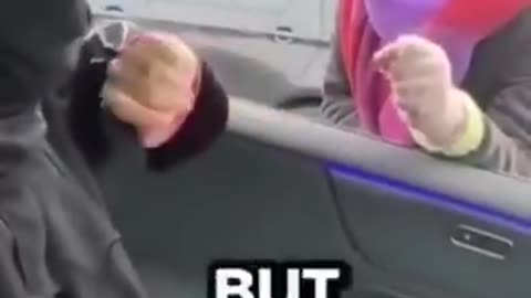 A British woman politely asks a Muslim couple parked in a disabled spot if they can move