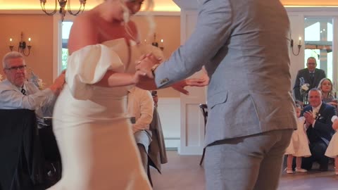 Groom Splits Pants While Lifting Bride