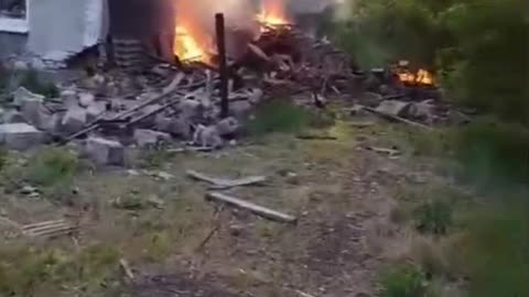 African Mercenary Crawls Away From Burning Building After Drone Strikes