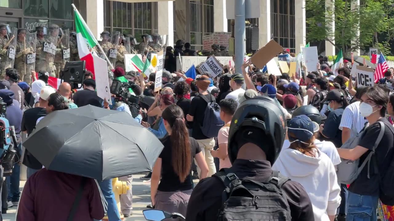 Protesters amass outside federal building in Los Angeles