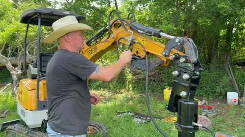 Digging Post Holes with a mini excavator