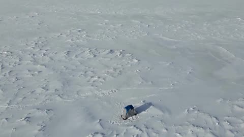 Frozen Lake Erie in Canada transforms into a snowy desert of ice