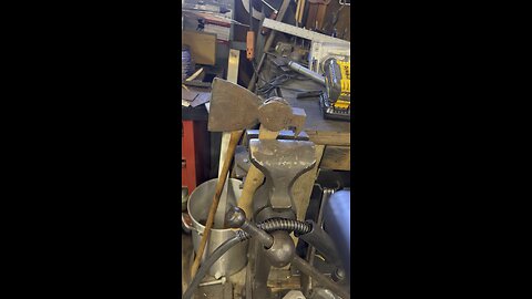 Getting a steel wedge out of a hatchet handle