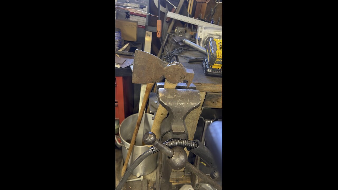 Getting a steel wedge out of a hatchet handle