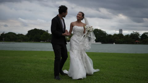 Slow motion Of Wedding Bride and groom Happy Fun in the park