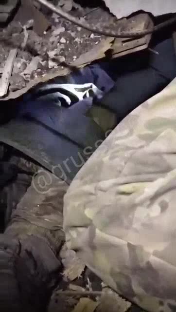 Russian Soldiers Trapped Under Leveled Building