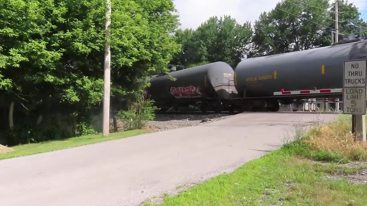 CSX mix freight train going through Creston, Ohio on June 30, 2024