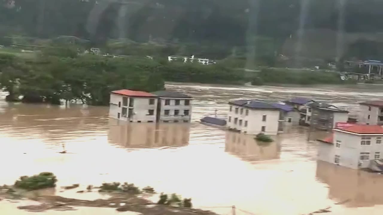 China floods 2025: shocking view from a moving train.