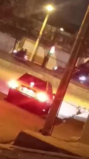 Iran - Police special forces firing rubber bullets at demonstrators.