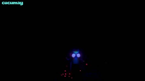 A tiny fish with big eyes transforming into a miniature robot-fish hybrid