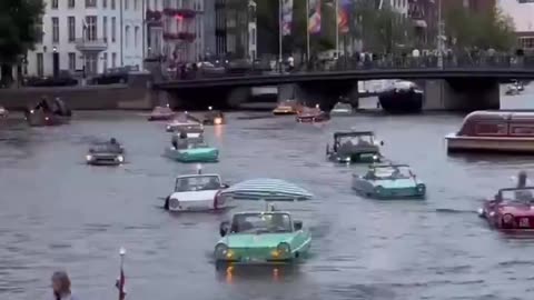 AMPHIBIOUS CAR PARADE IN AMSTERDAM