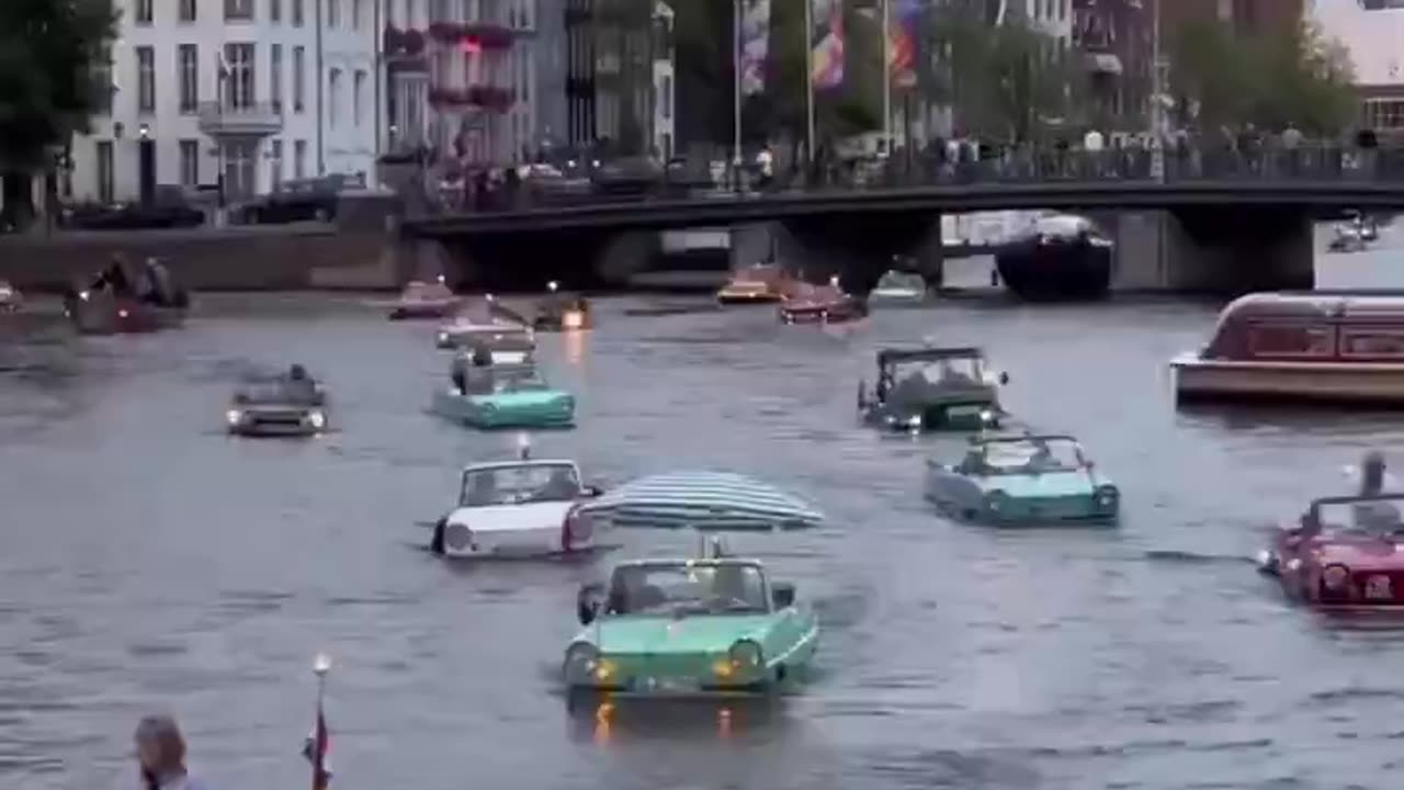 AMPHIBIOUS CAR PARADE IN AMSTERDAM