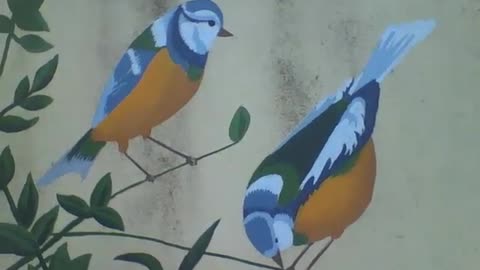 2 beautiful birds, drawn on a tree branch on the wall [Nature & Animals]