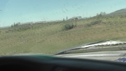 Box hanging out in the field next to the gas station