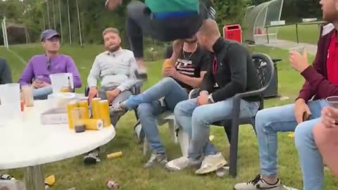 Wrestling Leap Onto Seated Friend