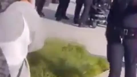 A man in an electric wheelchair running from the cops