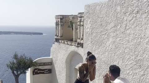 Dream Santorini Proposal Ruined By Snacking Tourists