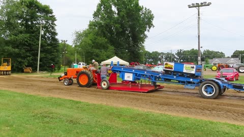 Awesome orange tractor during the tractor pull in Marshallville, Ohio