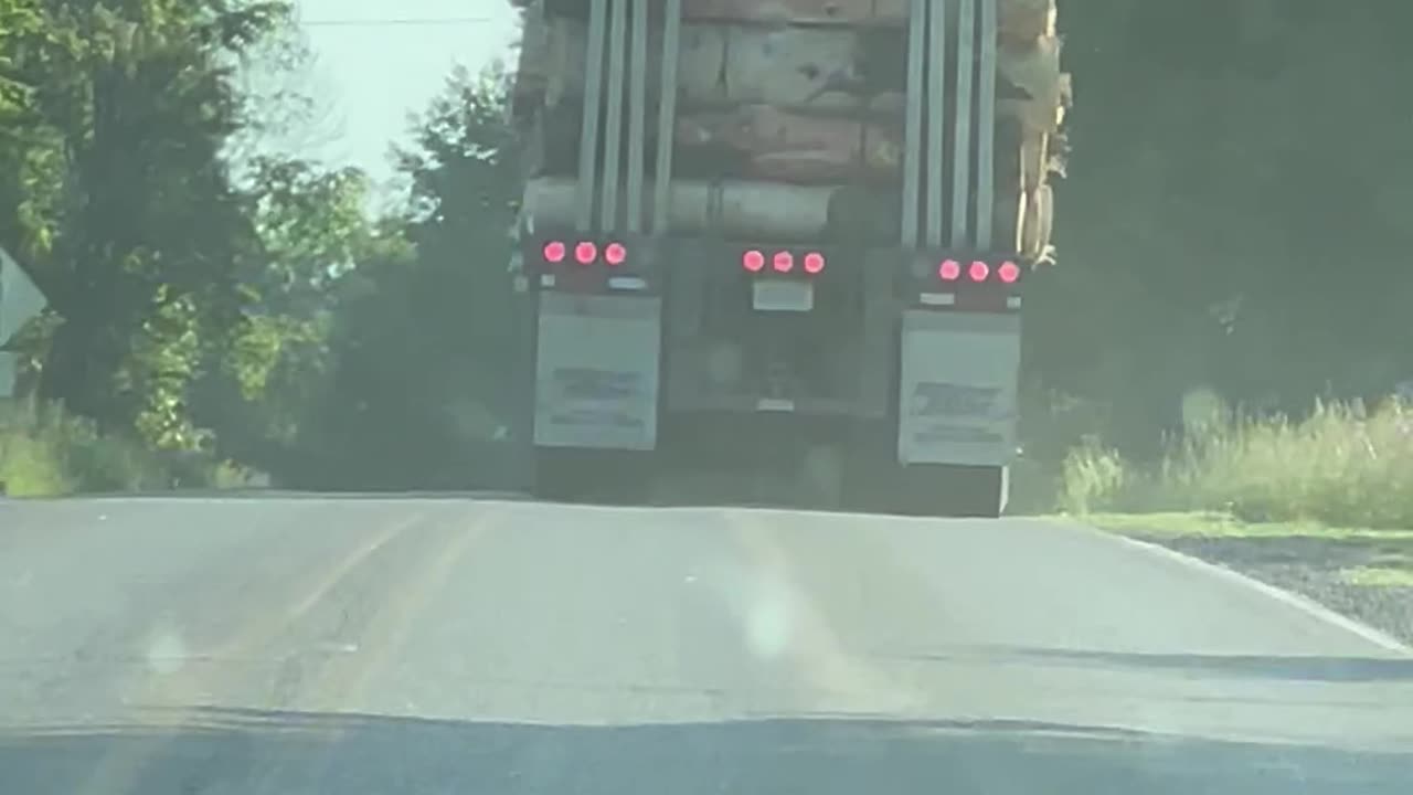 Lumber Truck Loses A Log
