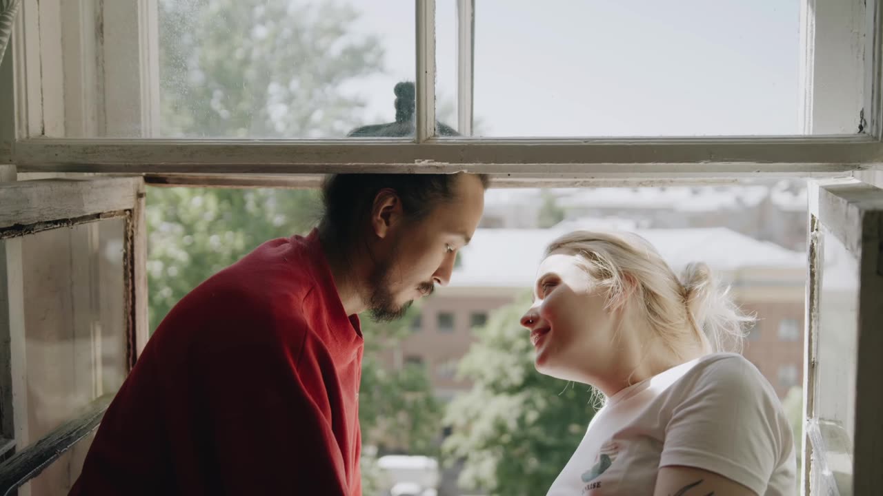 A Couple Sweet Moment By The Window