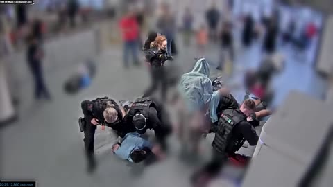 Bodycam footage of alleged assault on police at Manchester Airport shown to jury